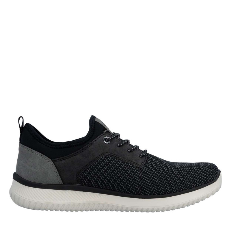 Sneakers noires à talon plat avec une languette d'aisance à l'arrière